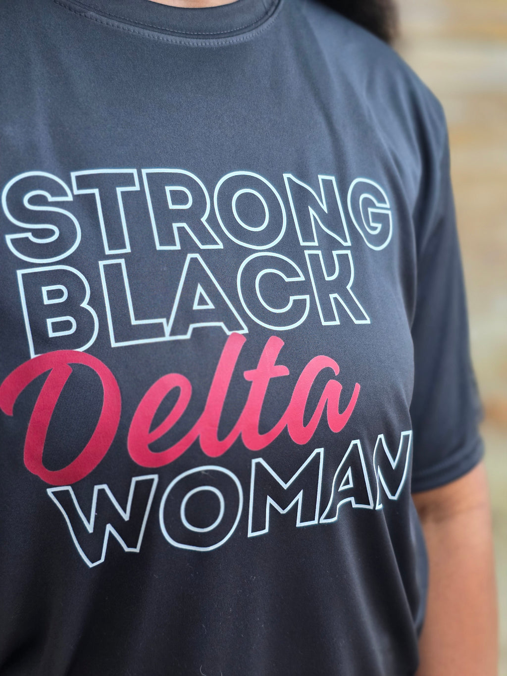 Strong Black Delta Short Sleeve Dri- Fit