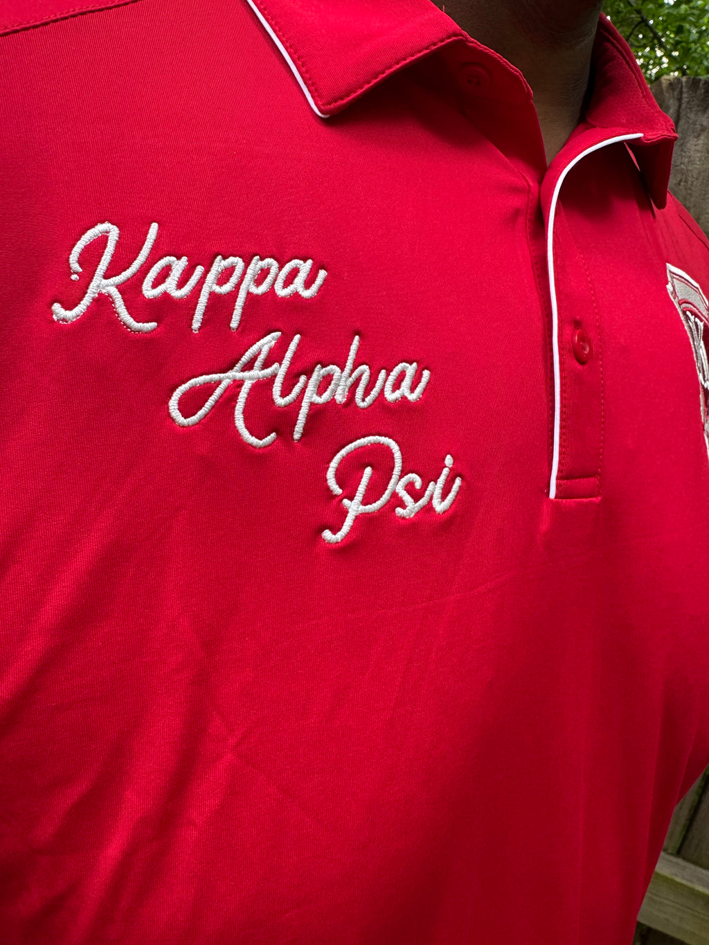 Kappa Alpha Psi Krimson and Kreme On The Green Embroidered Polo