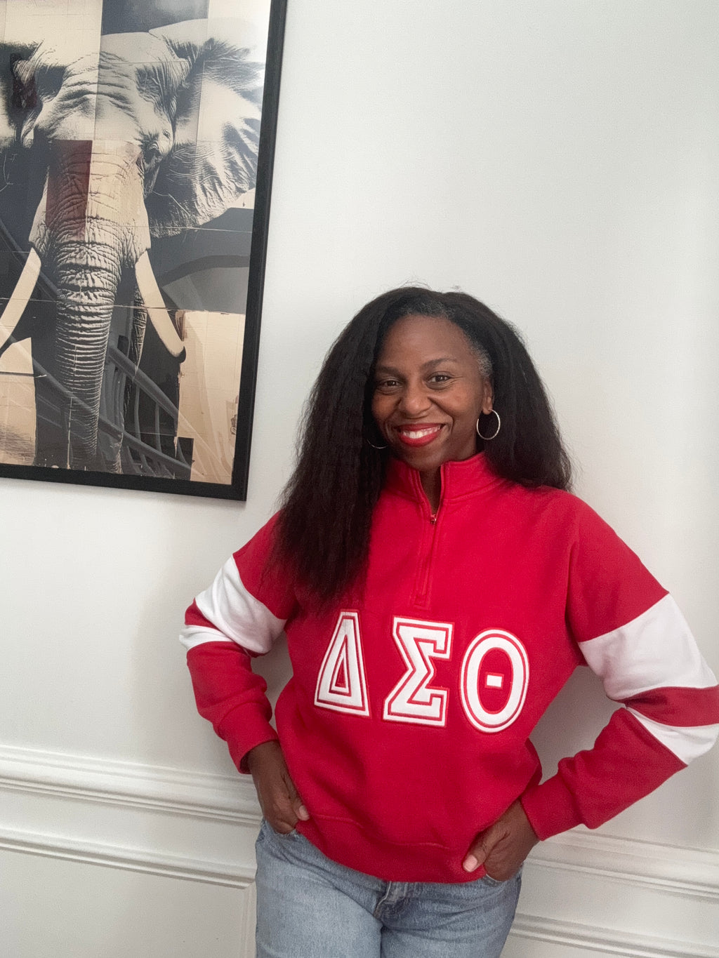 Delta Sigma Theta red and white cropped pullover sweatshirt with embroidered Greek letters front view