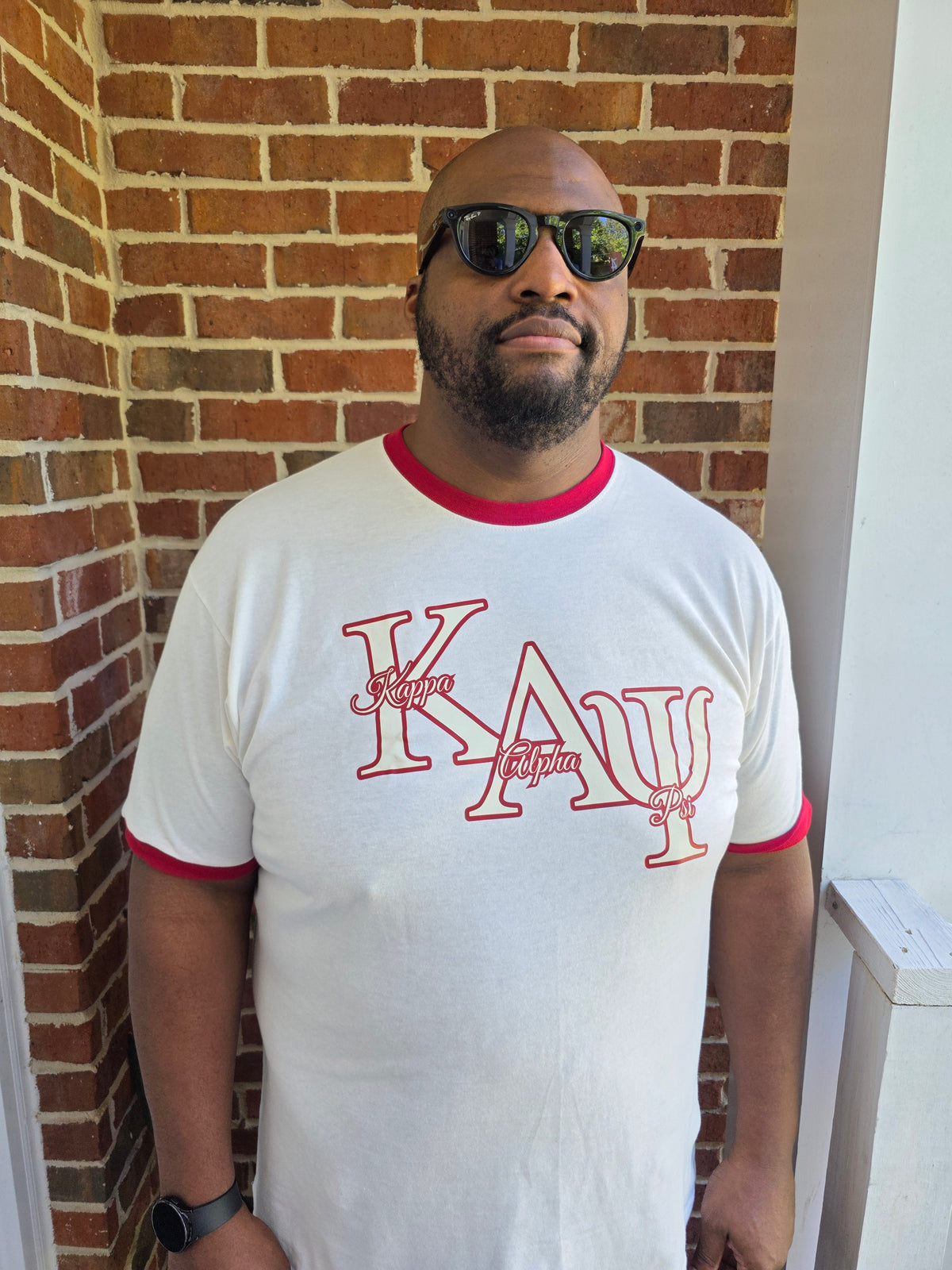 Kappa Alpha Psi cream ringer t-shirt with crimson red neck and sleeve ribbing front view