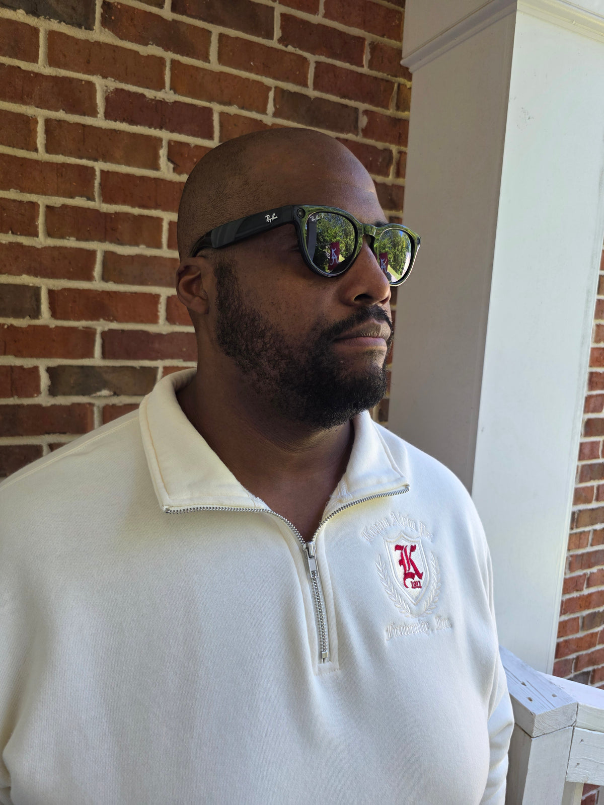 Kappa Alpha Psi cream quarter-zip fleece pullover with embroidered Greek letters across chest front view